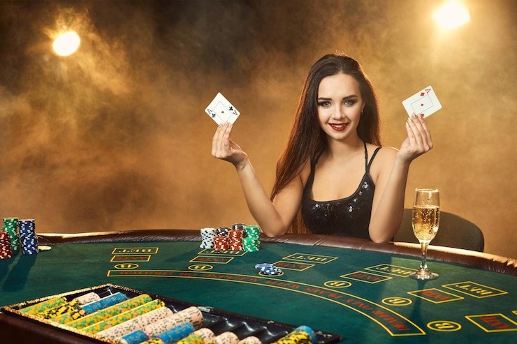 Caribbean Stud Poker mobile interface on phone showing cards and betting buttons